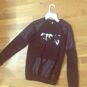 Leather shoulder and pocket heavy long sleeve.